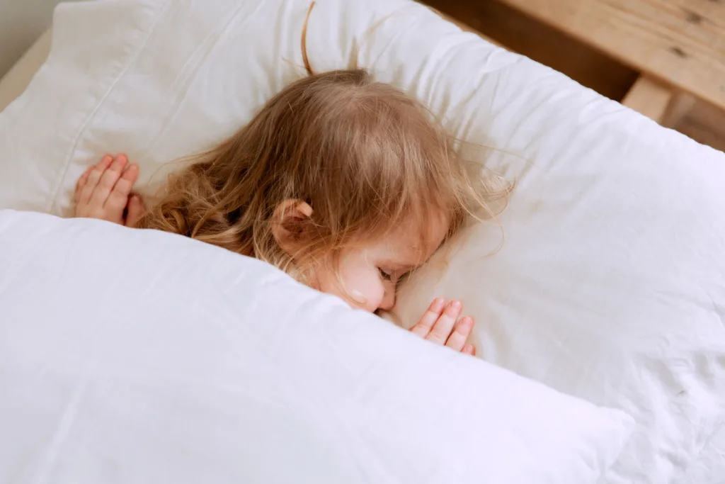 Sleep Hygiene - Photo Of Child Laying On Bed