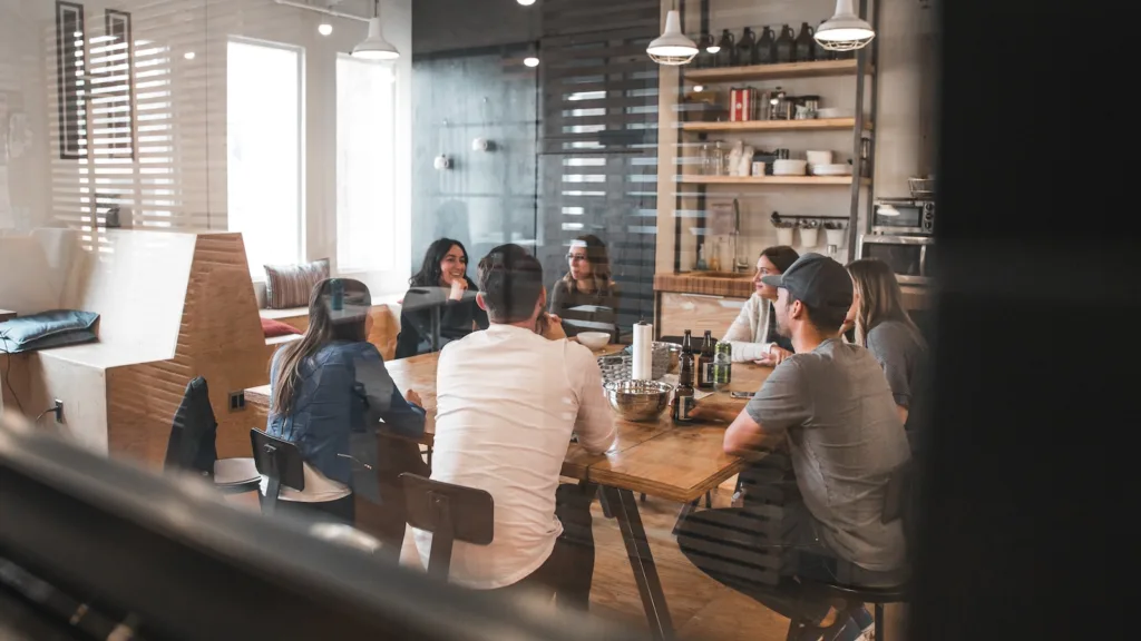 Activecampaign vs ClickFunnels - people sitting on chair