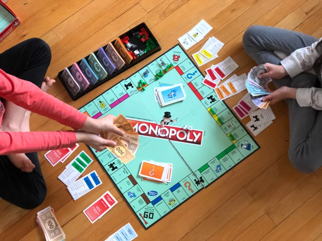 Teaching Kids about Money - playing monopoly