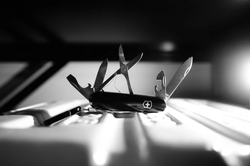 Emergency kit a pair of scissors sitting on top of a table