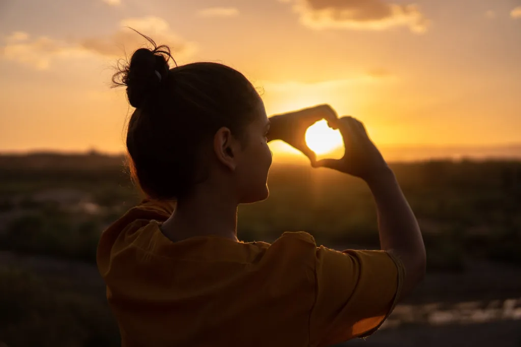 Gratitude - Woman Doing Hand Heart Sign