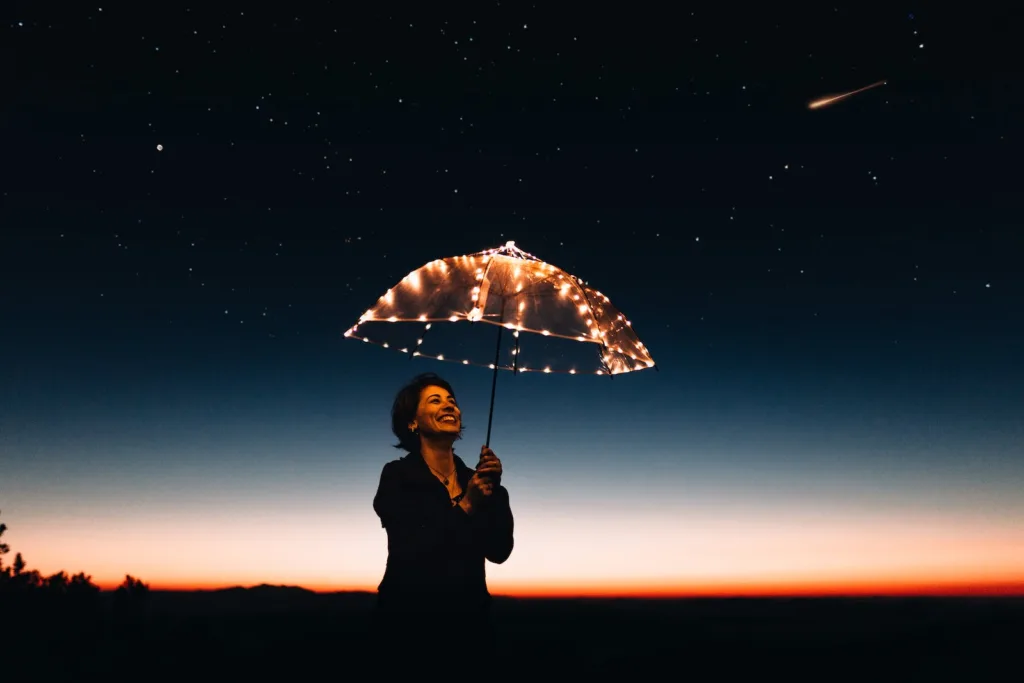 Gratitude - Woman Using Umbrella With Lights